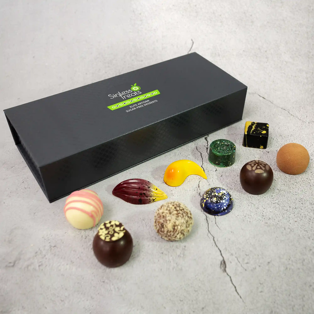 Amore Luxury Chocolate Box showing the 10 bonbons and truffles in front of a closed gift box