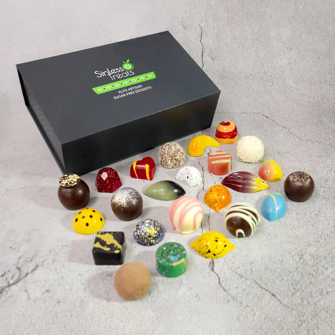 Constellation Luxury Gift Box with 24 brightly hand-painted chocolate bonbons and creamy truffles, 1 of each flavor in the Luxury Collection