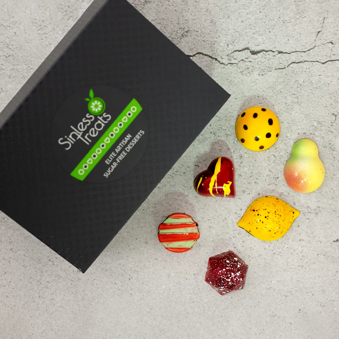 Vida Luxury chocolate gift box with 6 pieces of brightly painted fruity flavored chocolates