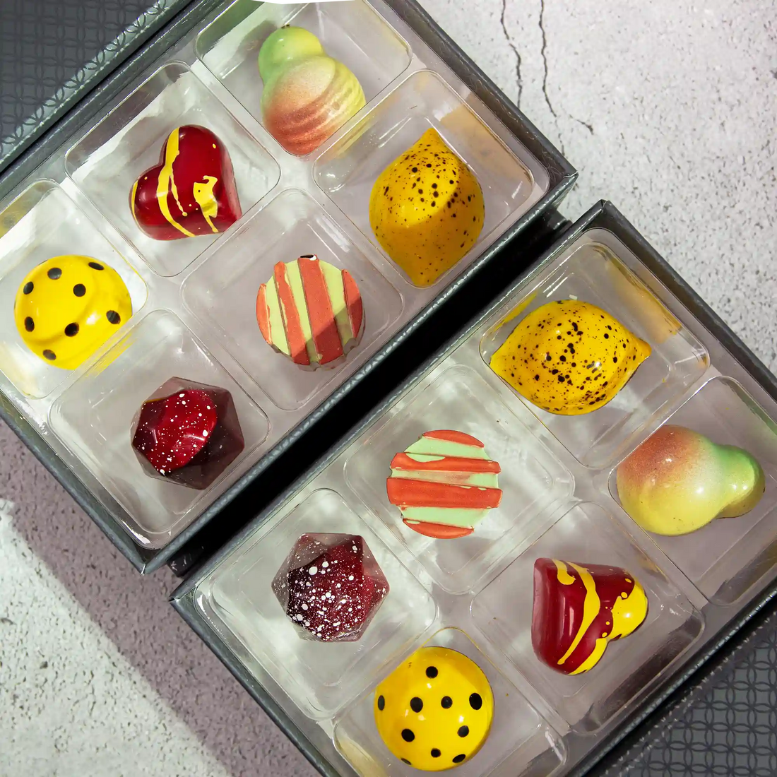 Vida Luxury chocolate gift box with 6 pieces of brightly painted fruity flavored chocolates