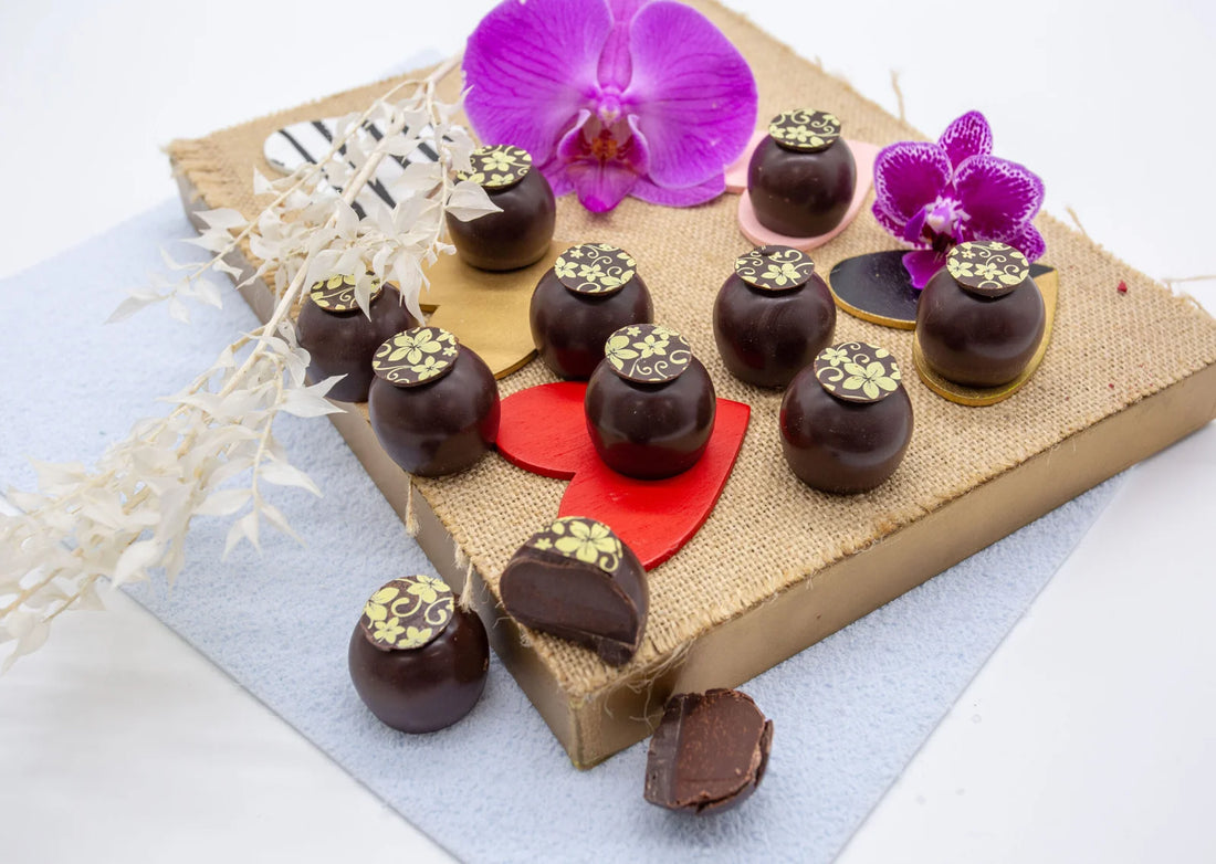 Classic Dark Truffle with dark chocolate shell and round chocolate topper with floral painted design