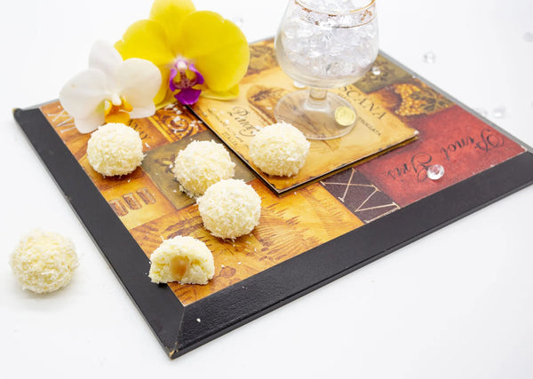 Coconut Cream white chocolate truffles coated with organic coconut flakes filled with a coconut-infused cream filling