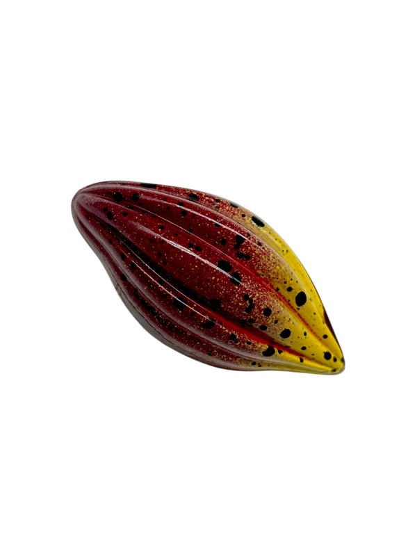 Dark chocolate sugar free chocolate bonbon shaped like a cacao fruit with red and yellow coloring