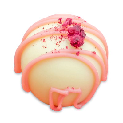 Indulgence raspberry white chocolate Truffle with sugar free white chocolate shell, topped with pink Ruby chocolate stripes and dried raspberries