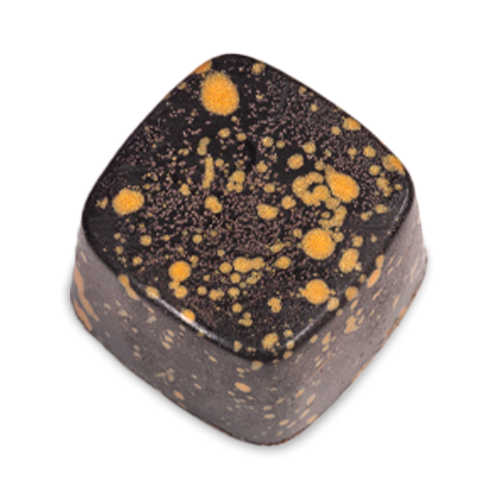 Irish Cream sugar free dark chocolate bonbon with orange splattered paint