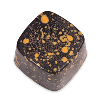 Irish Cream sugar free dark chocolate bonbon with orange splattered paint