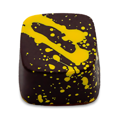 Lemon Curd dark chocolate bonbon with yellow splattered paint