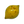 Lemon Ginger lemon-shaped sugar free dark chocolate bonbon with bright yellow coloring and dark speckles