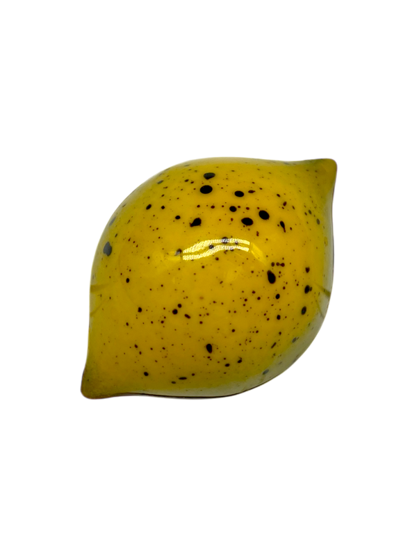 Lemon Ginger lemon-shaped sugar free dark chocolate bonbon with bright yellow coloring and dark speckles