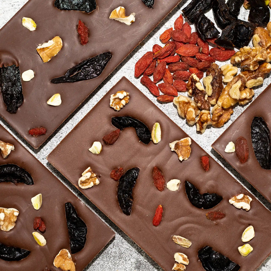 Sweet Fantasy - front and back of Milk Chocolate Bar with Prunes, Goji Berries, Walnuts, and Pistachios