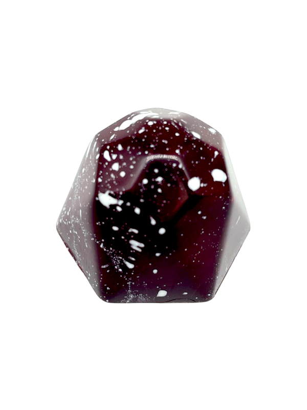 Raspberry Rose sugar free dark chocolate bonbon with deep red color and white speckles
