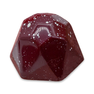 Raspberry Rose sugar free dark chocolate bonbon with deep red color and white speckles