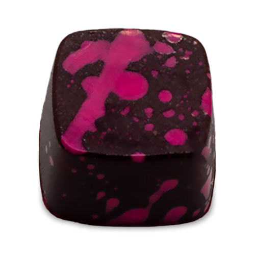 Roses and Raspberries dark chocolate bonbon with pink splattered paint