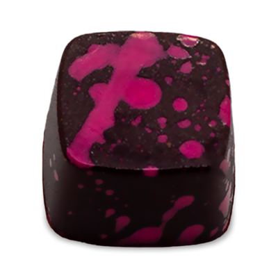 Roses and Raspberries dark chocolate bonbon with pink splattered paint