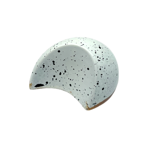 Vanilla Cream - Sugar Free Dark Chocolate Bonbon in half-moon shape with white shell and black speckles