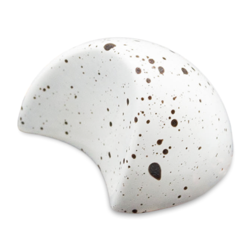 Vanilla Cream - Sugar Free Dark Chocolate Bonbon in half-moon shape with white shell and black speckles