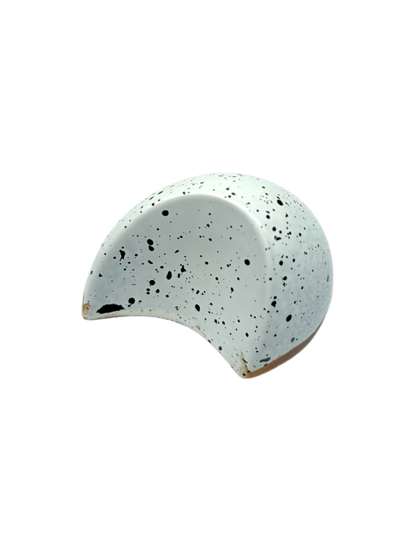 Vanilla Cream - Sugar Free Dark Chocolate Bonbon in half-moon shape with white shell and black speckles