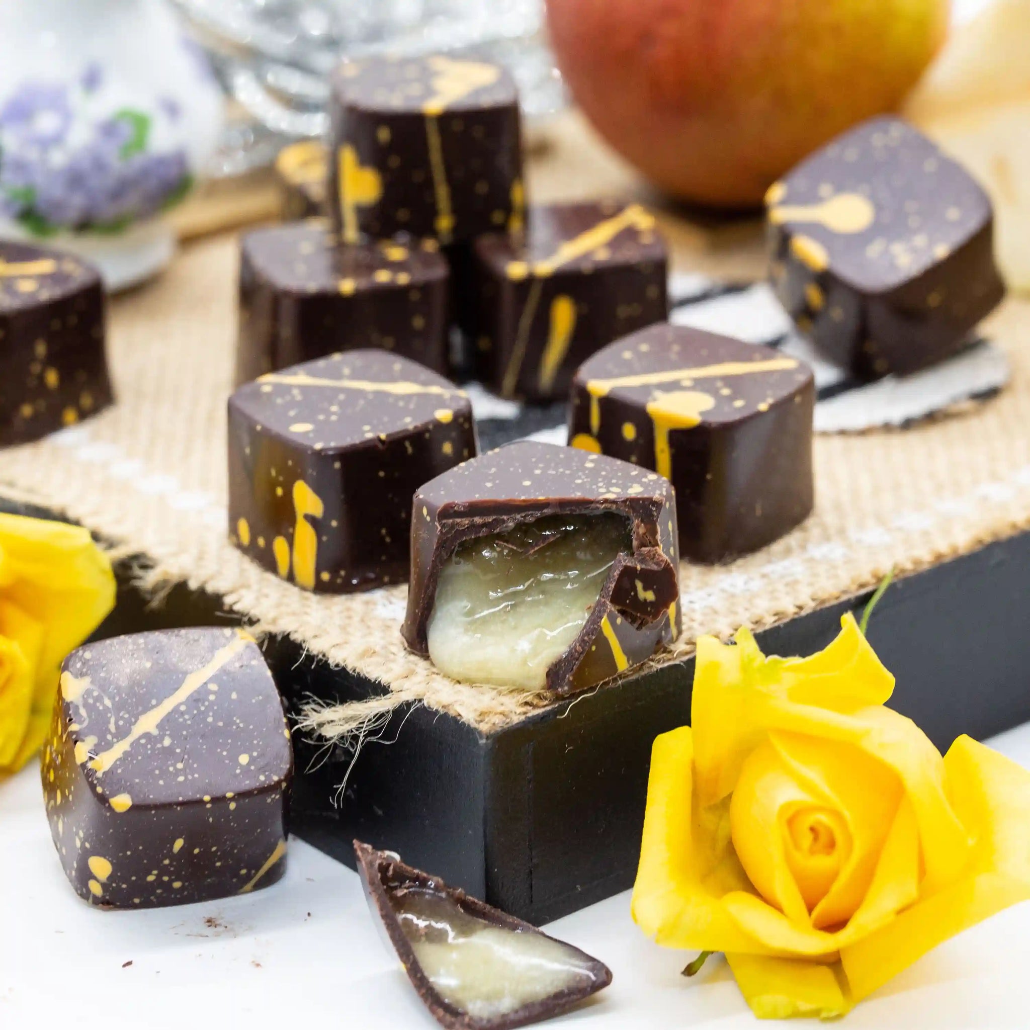 Closes up of Fruity Caramel bonbons with pear jam and caramel filling made with allulose sugar substitute